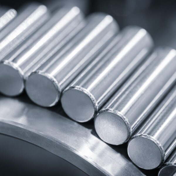 roller bearings as industrial metal concept background, blank for creativity close-up selective focus Close-up of cylindrical roller bearings.